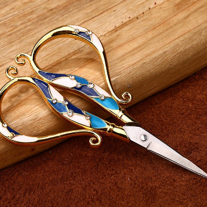 Vintage-inspired crafting scissors, '70s aesthetic scissors, Antique tailor scissors, Rustic crafting tool, Old-fashioned sewing accessory, Classic hand-forged scissors, Retro-style crafting tool, Timeless crafting scissors, Elegant antique craft tool, Nostalgic crafting accessory.