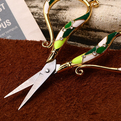 Vintage-inspired crafting scissors, '70s aesthetic scissors, Antique tailor scissors, Rustic crafting tool, Old-fashioned sewing accessory, Classic hand-forged scissors, Retro-style crafting tool, Timeless crafting scissors, Elegant antique craft tool, Nostalgic crafting accessory.