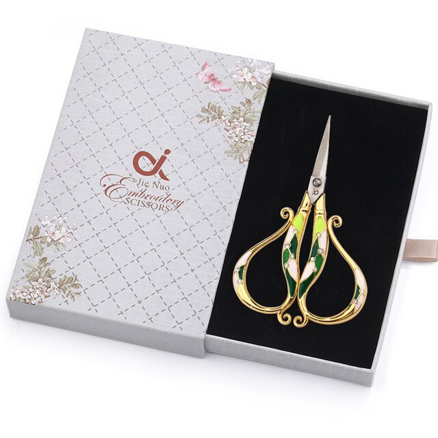 Vintage-inspired crafting scissors, '70s aesthetic scissors, Antique tailor scissors, Rustic crafting tool, Old-fashioned sewing accessory, Classic hand-forged scissors, Retro-style crafting tool, Timeless crafting scissors, Elegant antique craft tool, Nostalgic crafting accessory.